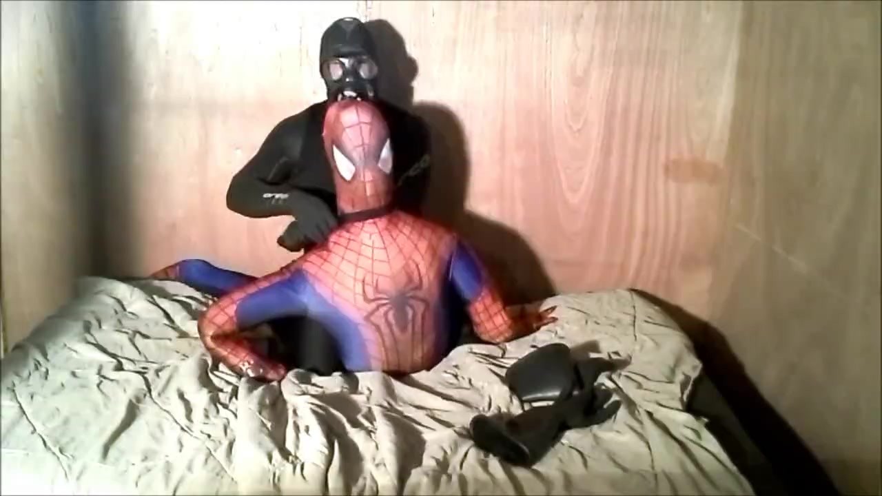 Gasmasked frogman takes off his black spandex to defeat spiderman