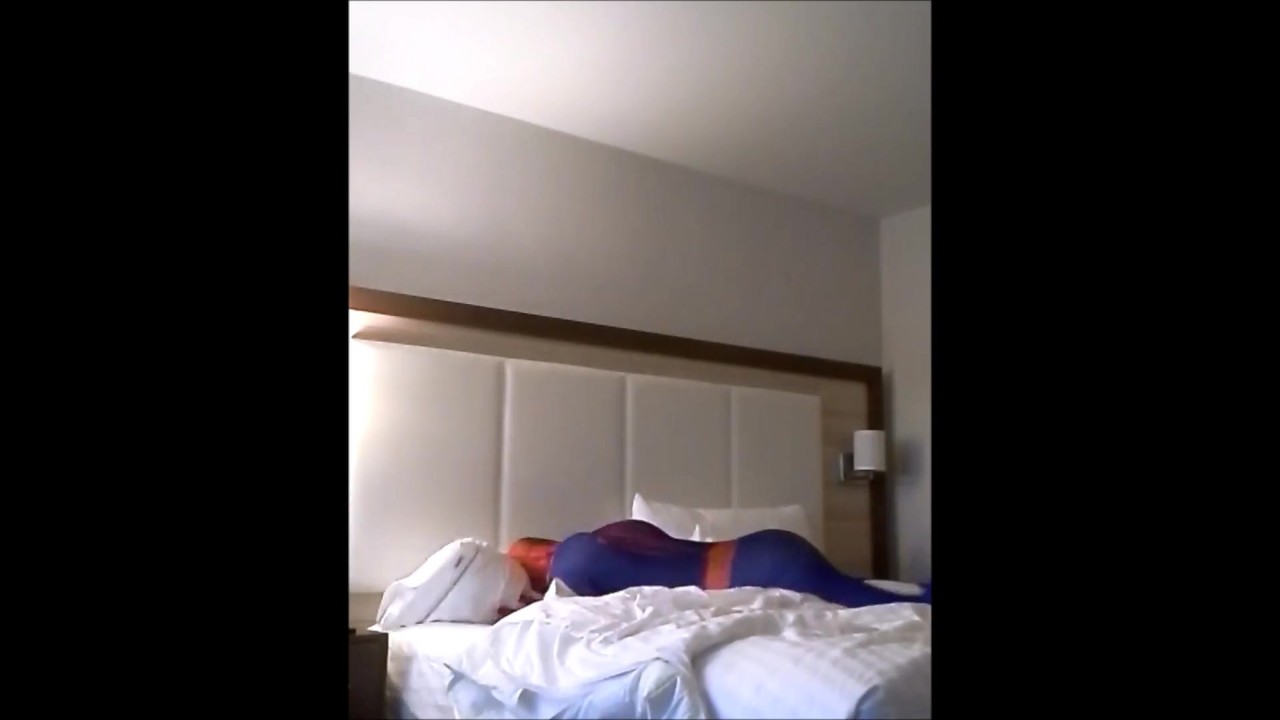 Spiderman on hotel bed