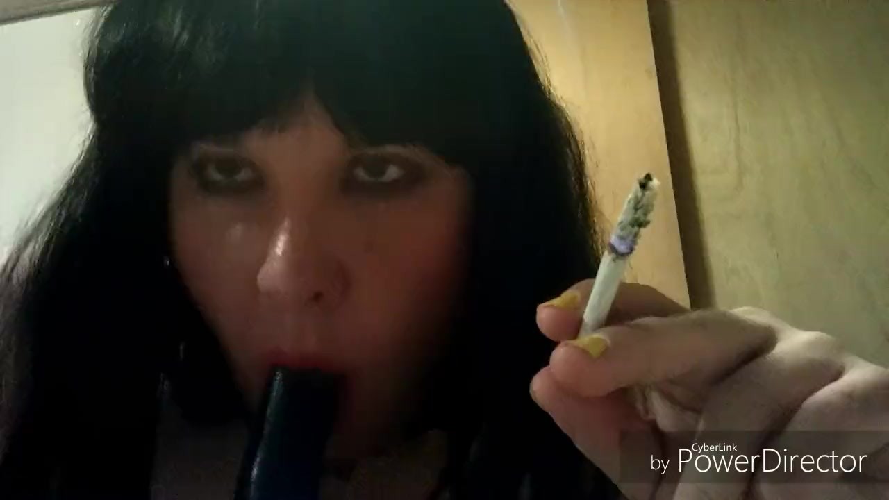 Ts Natalie Jenkins Smoking and sucking on a dildo