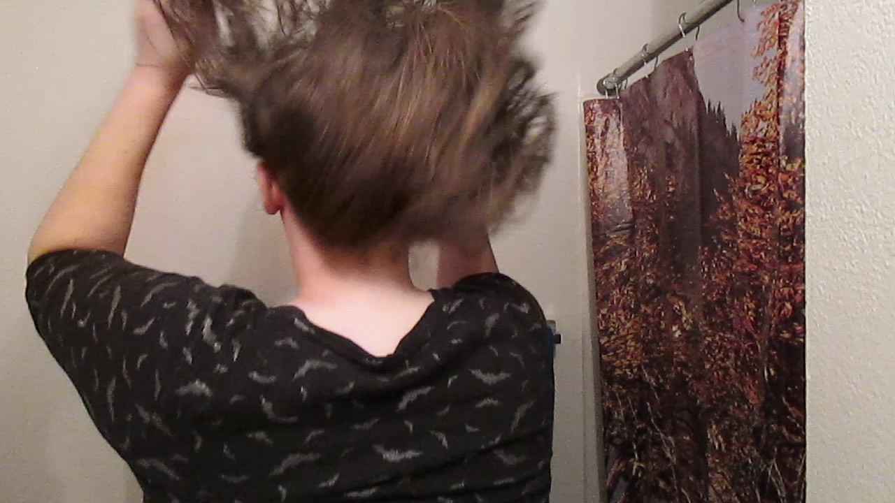 Taking Out a Lazy Bun with Long Curly Hair