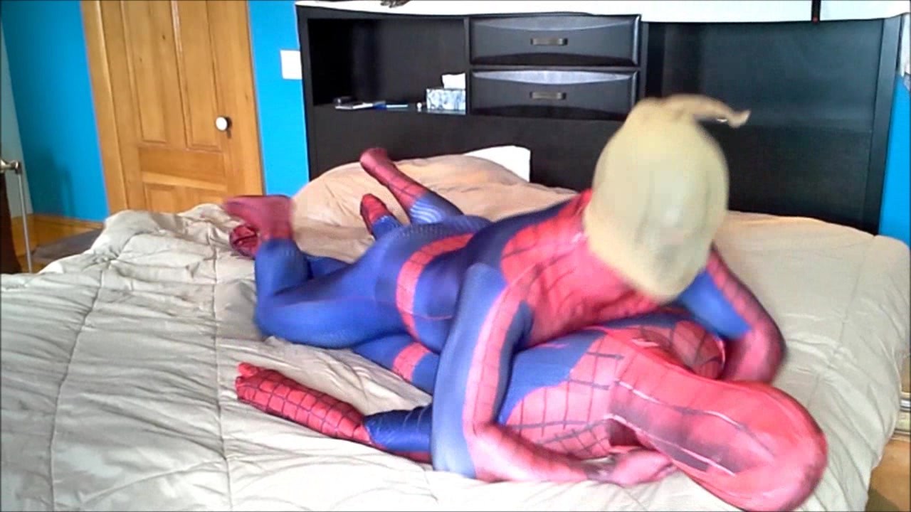 masked spiderman struggles against spiderman