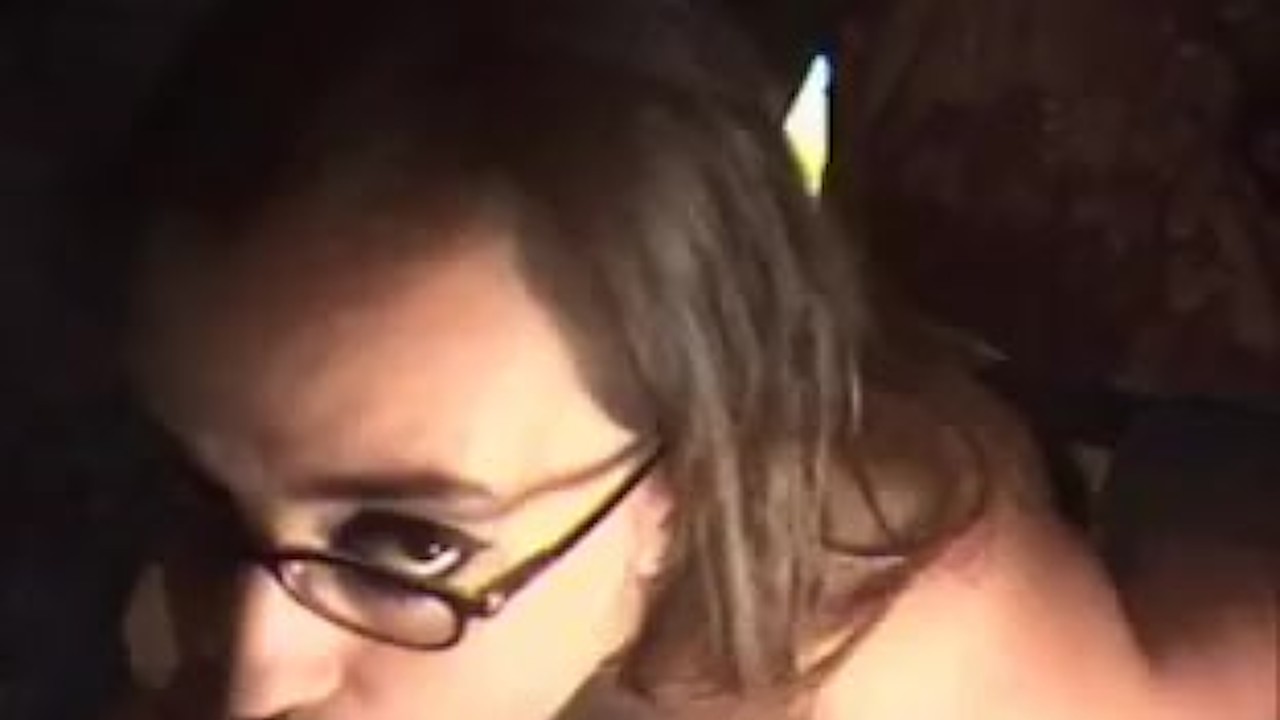 Sexy brunette in glasses knows how to suck a cock
