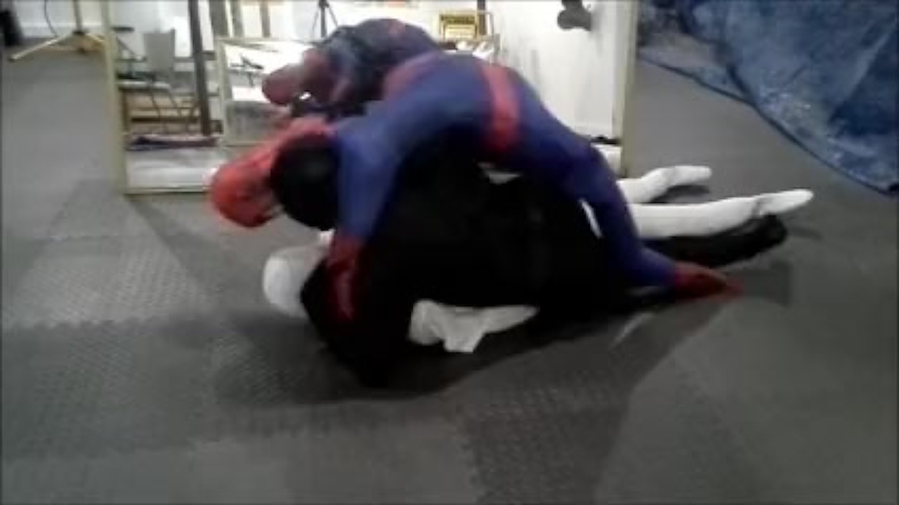 black meshed frogman vs white spandex and spiderman dummy