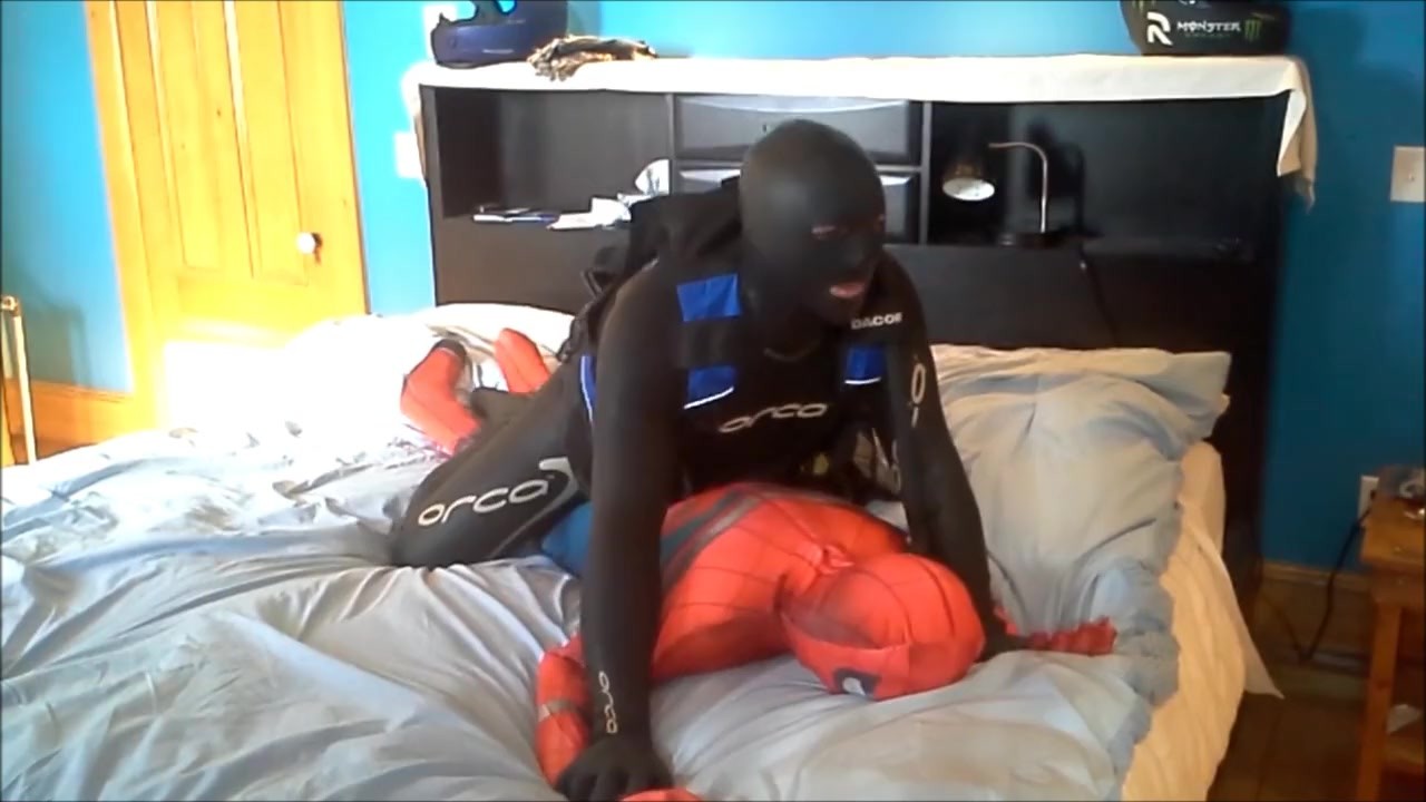 orca frogman playing with spiderman dummy