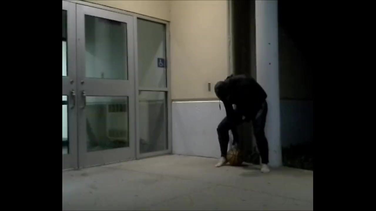 barefoot frogman cums inside a condom in front of hotel doors