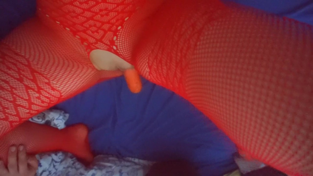 Penetrating the bunny with a carrot. Try not to cum