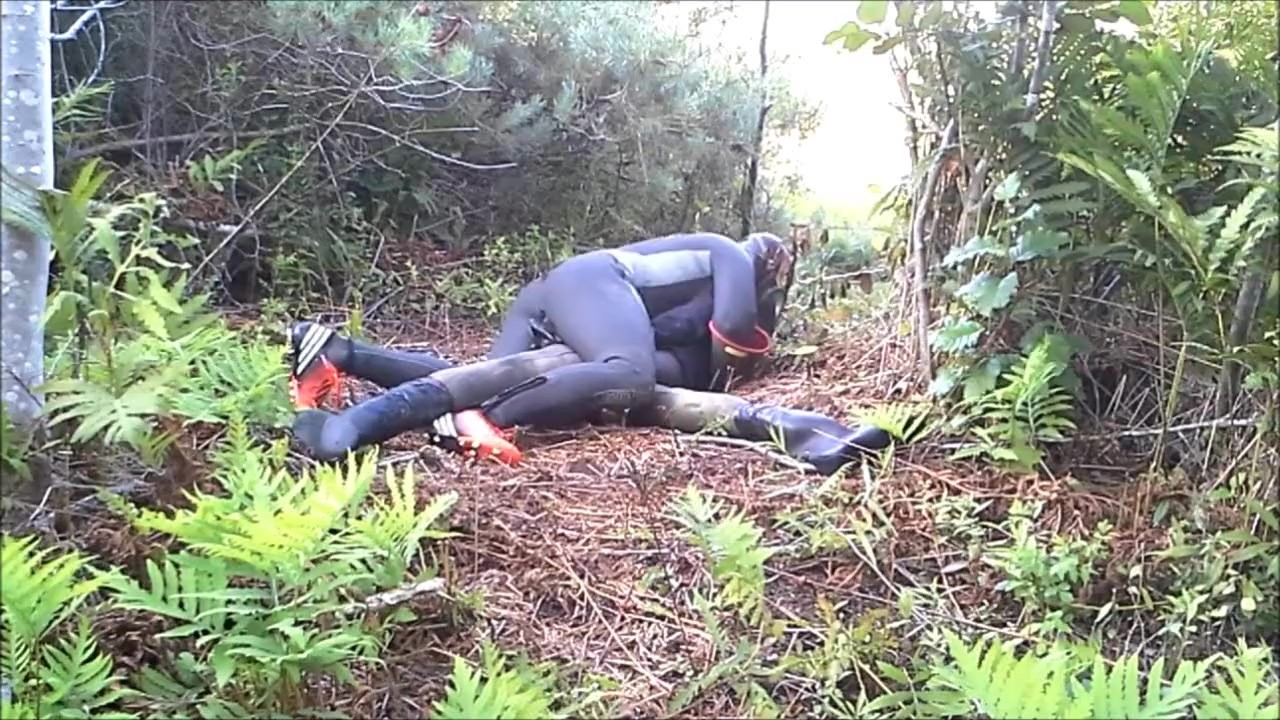 outdoors frogman in cleats attacks dummy
