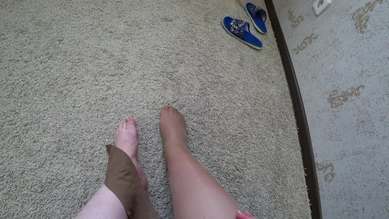 ASMR. Plump legs put on nylon tights. Foot fetish POV.