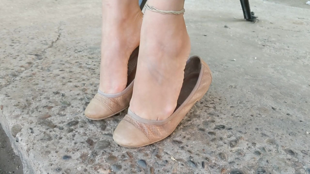 Dangling and shoeplay with flats in the park