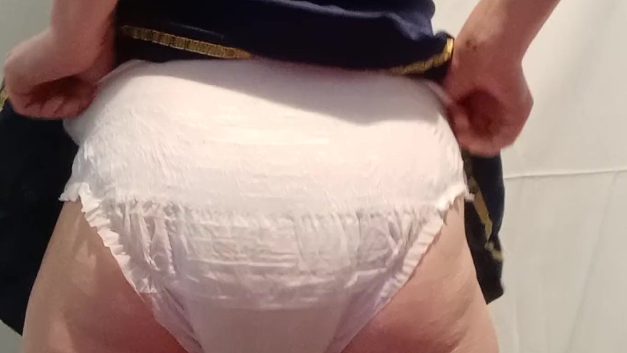 Cute sailor girl pisses diaper