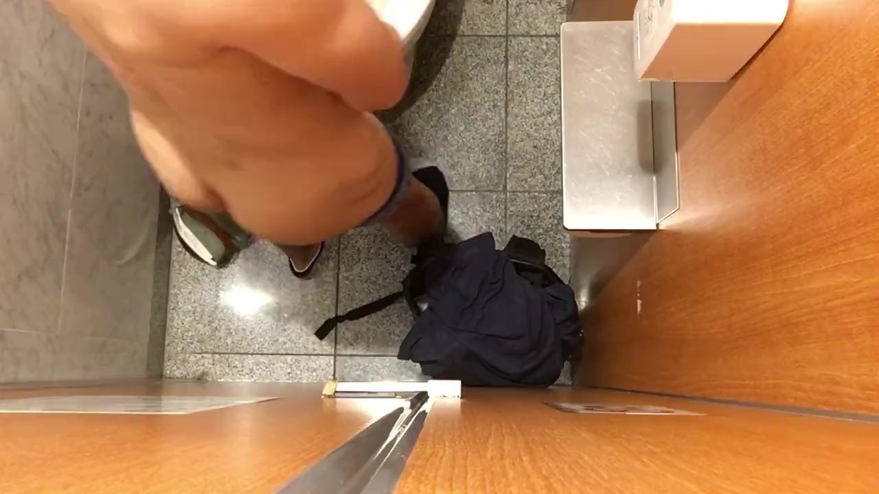 Jerking off in a shopping mall toilet