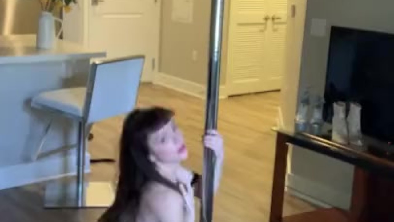 Girl strips naked on pole