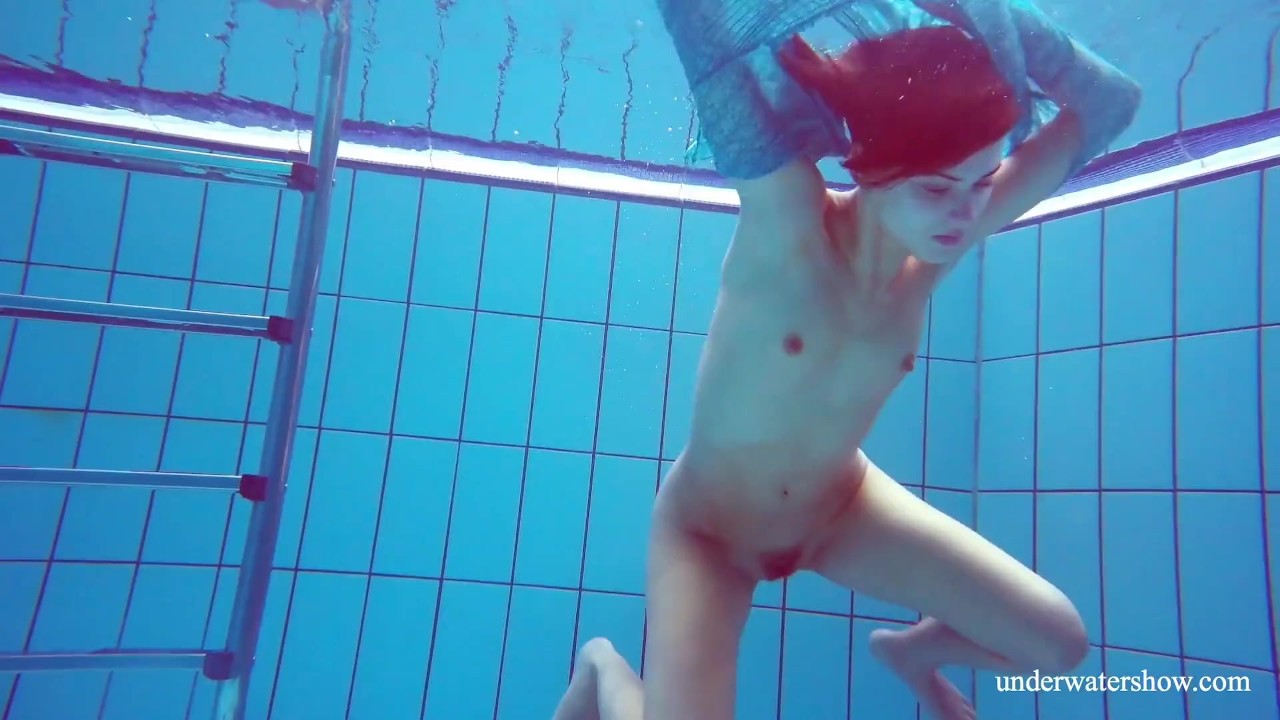 Redhead Russian hairy babe swimming pool action