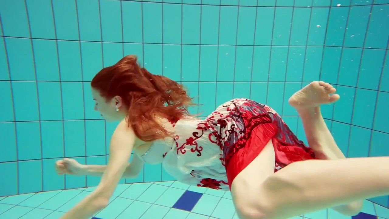 Polish babe Marketa gets wet in the pool