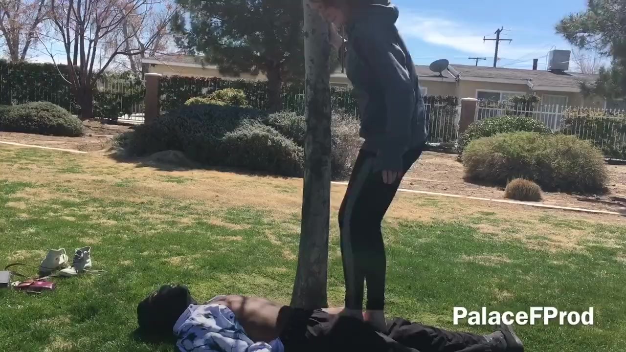 Tall Friend Jumping and Stomping Trample at the Park