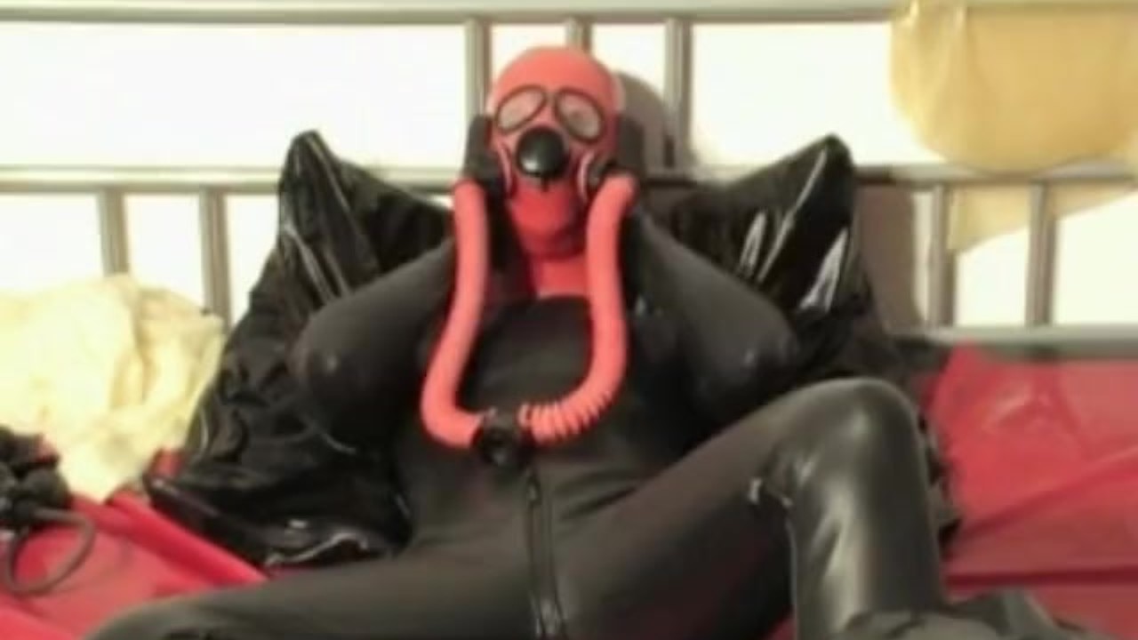 Girl In Heavy Rubber Latex Breath Play With Mask + Gag Mouth And Gas Mask