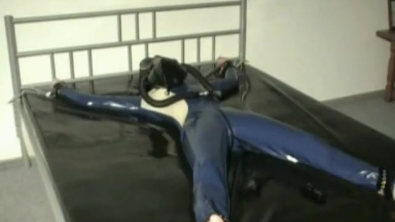 Latex Girl Sub Bondage In The Rubber Bed With Heavy Latex Gas Mask