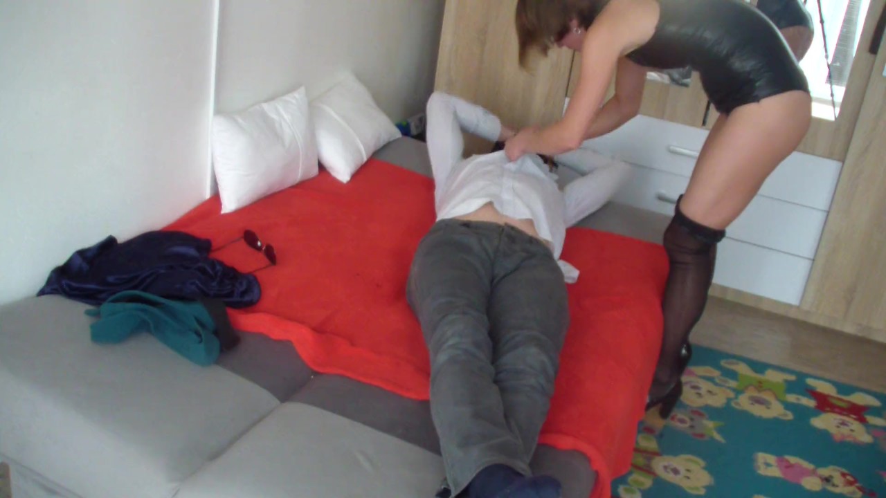 Young russian mistress humiliates and fucks a submissive man - part 1