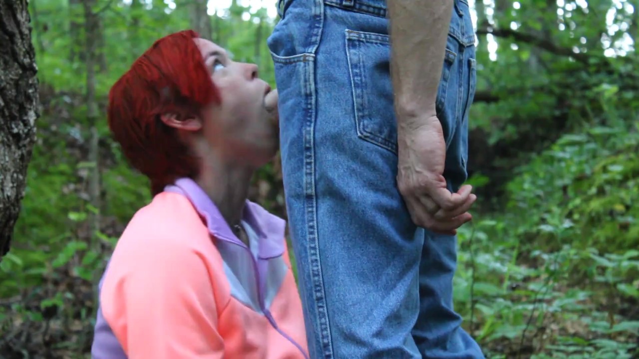 Giving the camp counselor a blowjob in the woods at summer camp