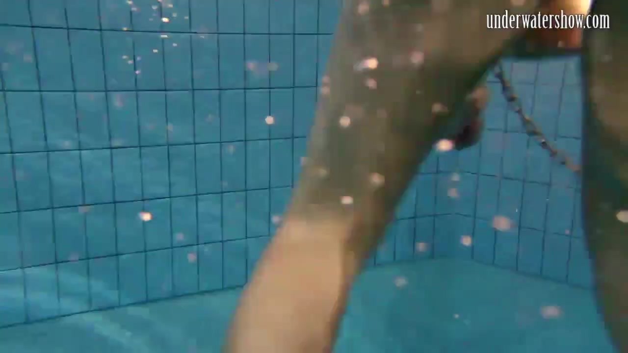 Croation teen Monica swims in the pool