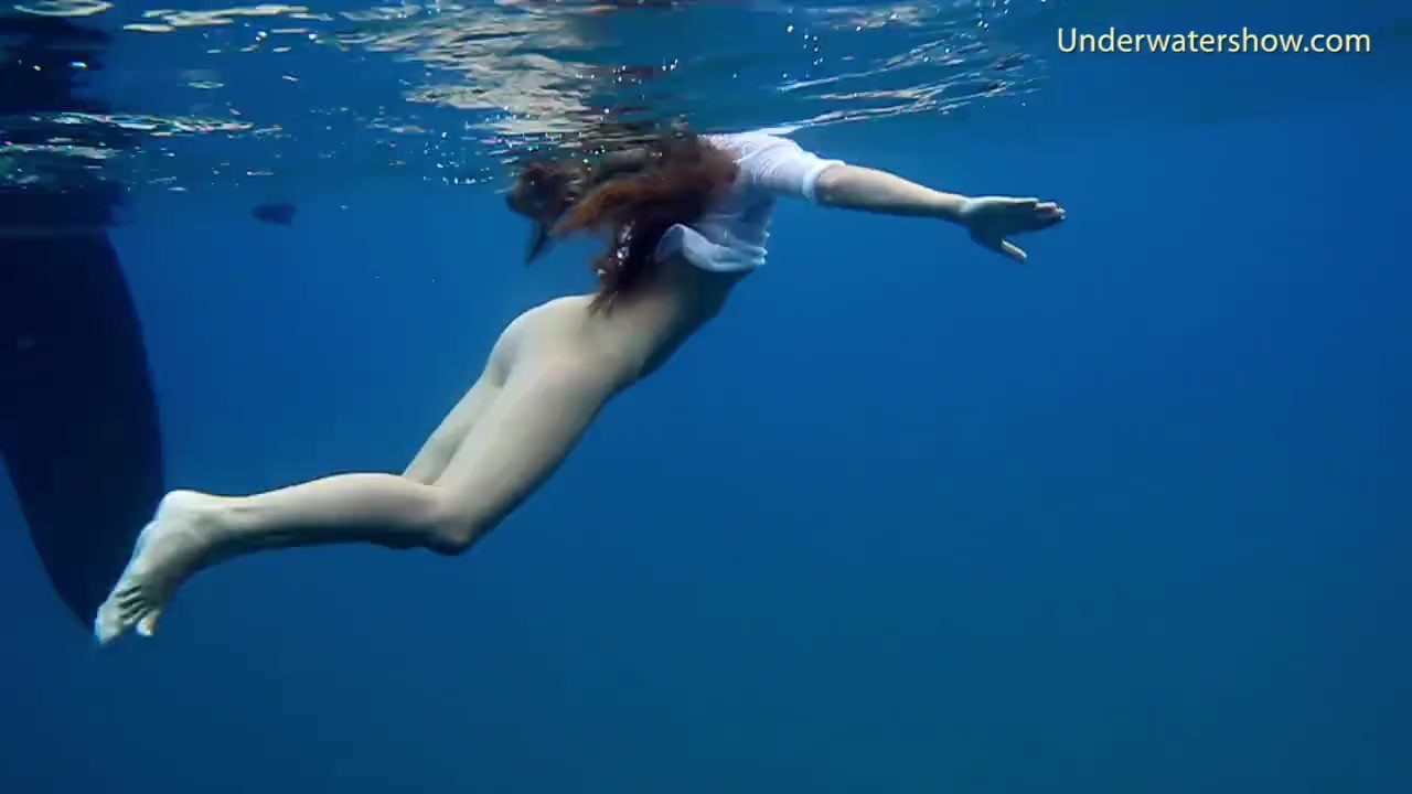 Underwater romantic nude swimming