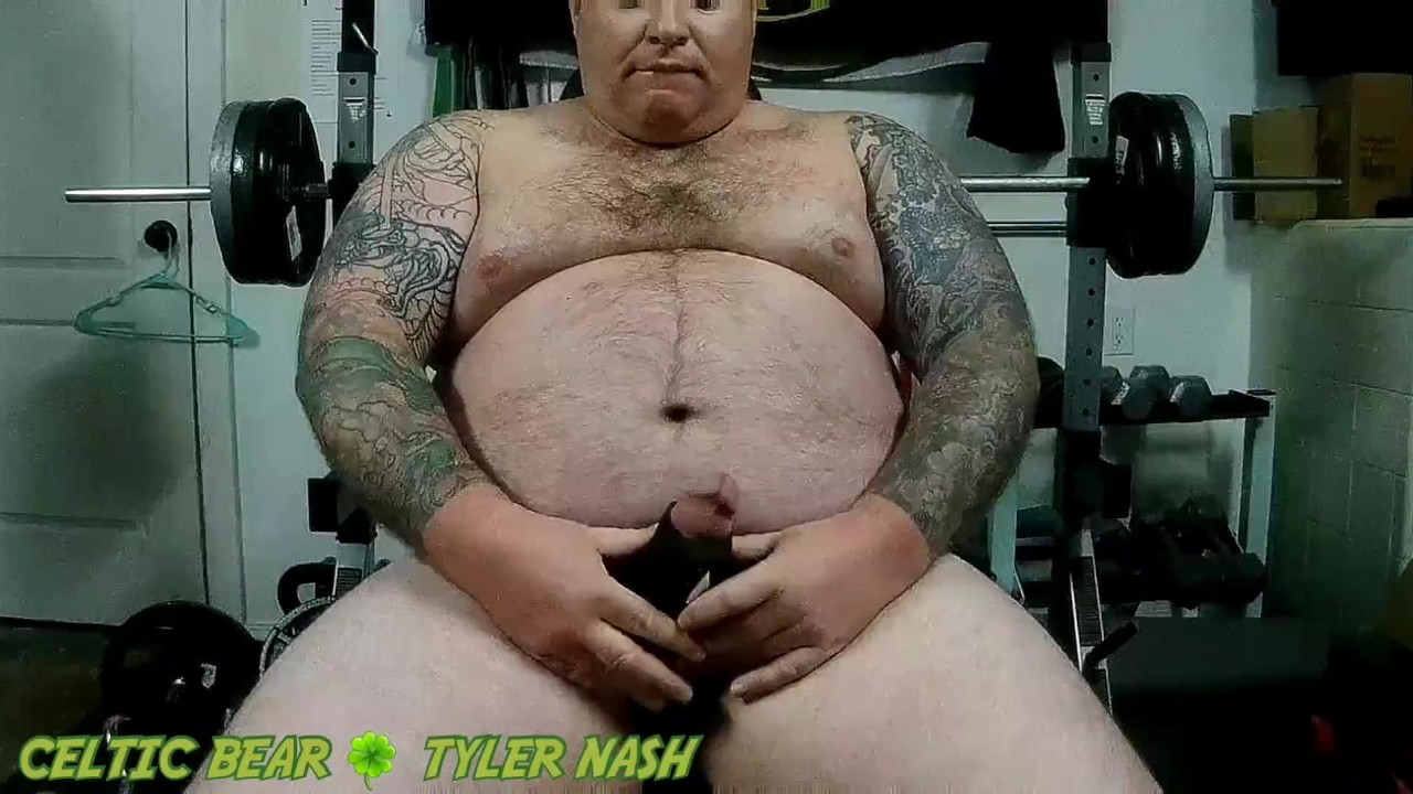 Beefy chub Tyler Nash stroking cock with a vibrating cock sleeve