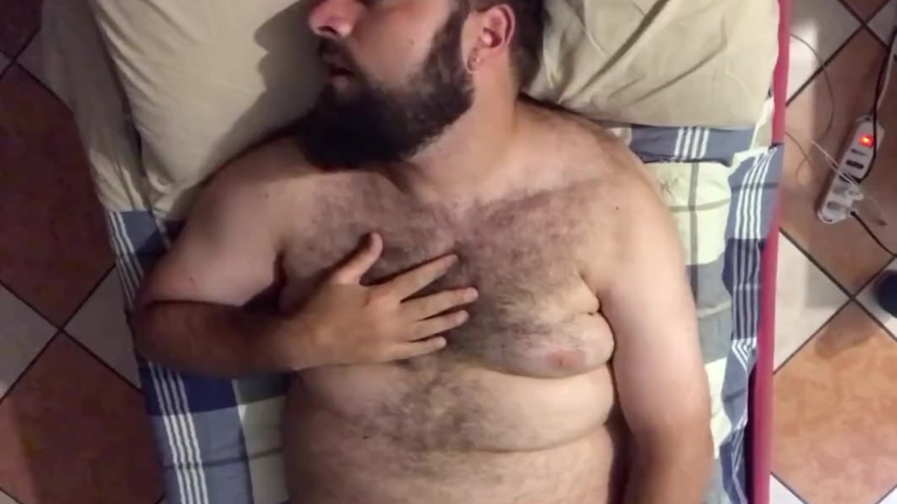 Big hairy bearded bear horny on the bed solo jerk off moaning a lot. Orgasm face. Beautiful Agony