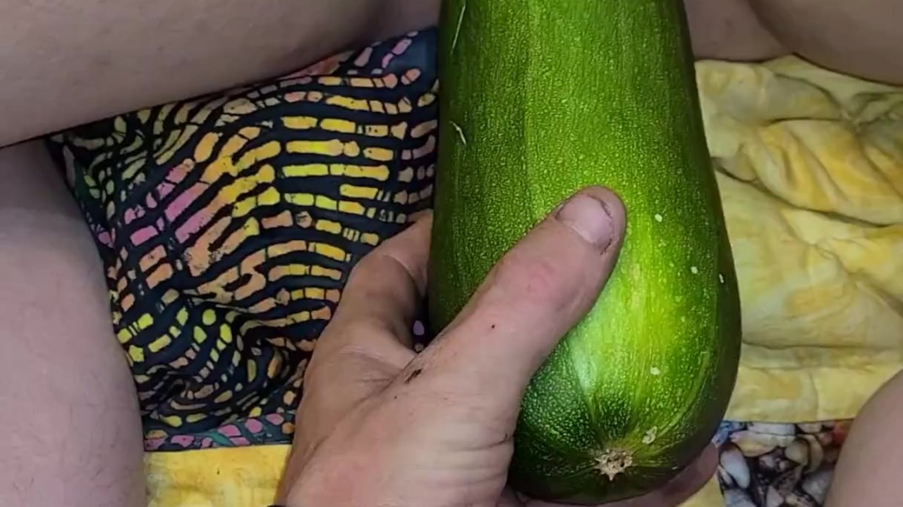 Boyfriend teases and penetrates my pussy with a giant squash from our garden.