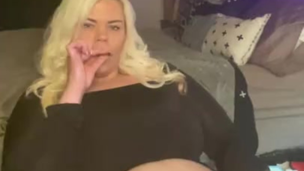 Cute Bbw smokes with belly play!
