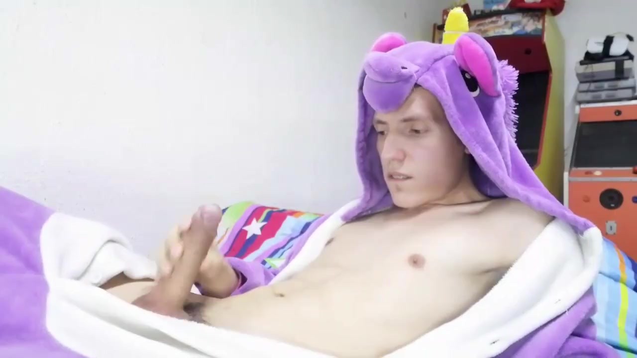 Cute teenager cum wearing a unicorn costume