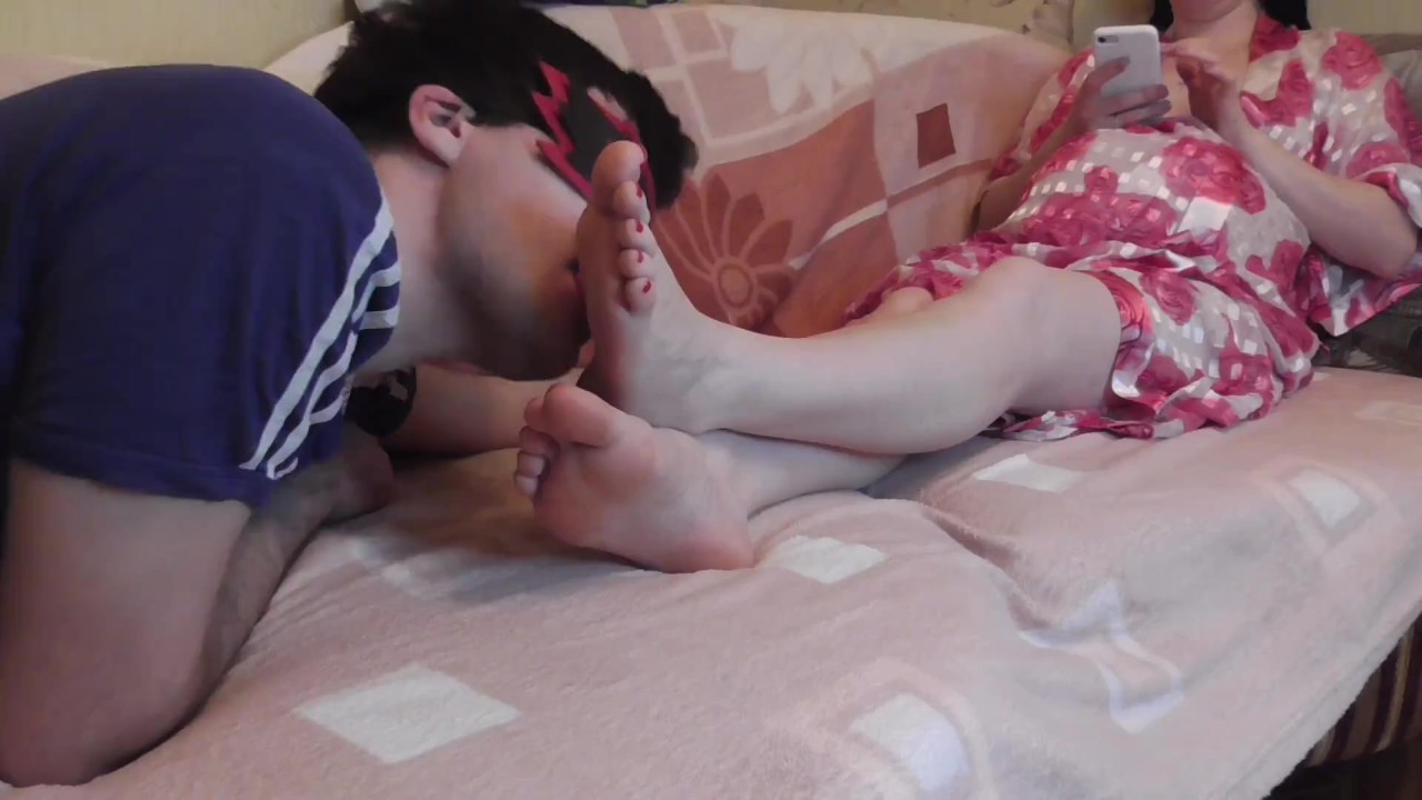 I lick my wife&apos;s feet while she chatting with her lover