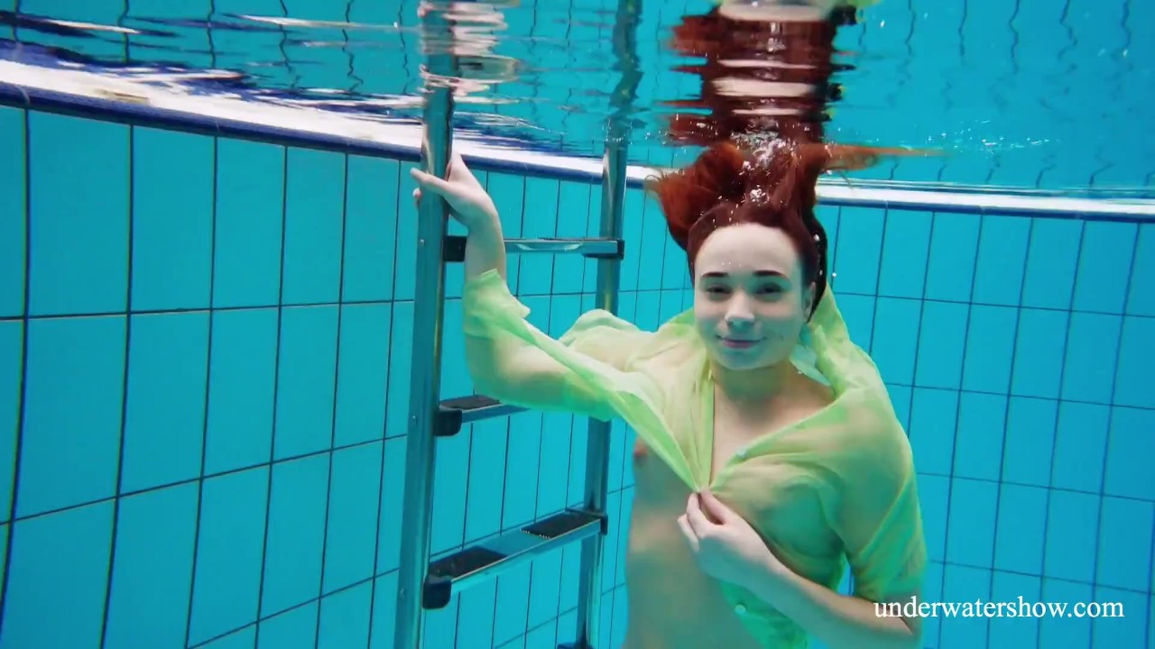 Cutest hairiest teenie Nina gets naked underwater