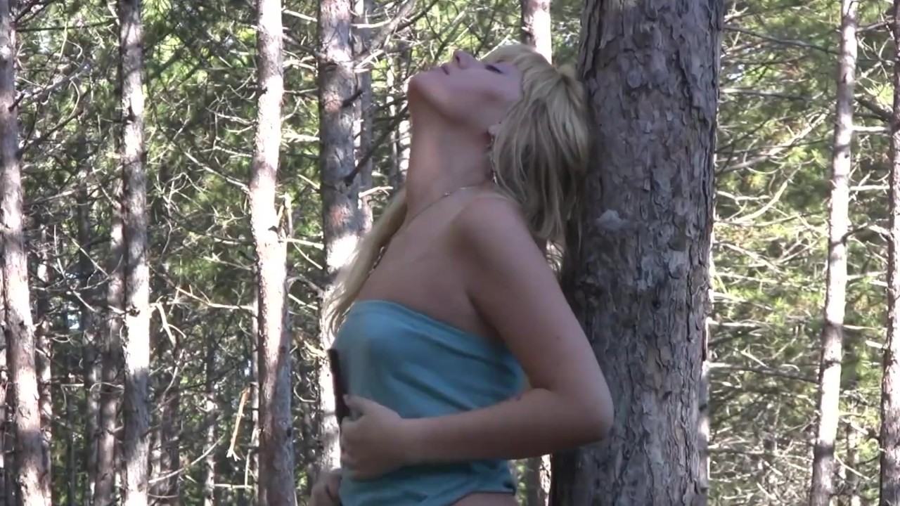 Spunky Blonde Teen Plays with Herself in the Forest