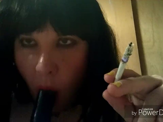 Ts Natalie Jenkins Smoking and Sucking on a Dildo 