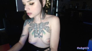 Tattooed Cam Girl Sucks and Gags on Dildo 