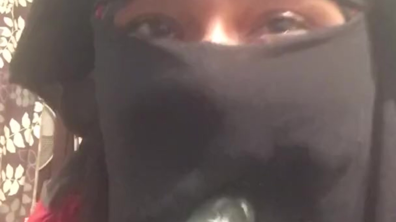 Lonely Niqabi Hijabi woman sucking dildo &amp; shaking ass