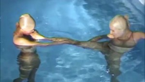 Two Wet Encased Shiny Pantyhose Horny Lesbians Playing In Pool - Nylon Mask