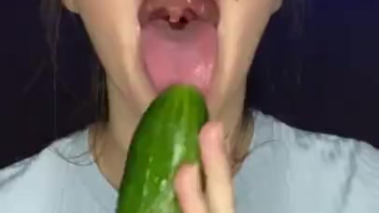 Testing little mouth with a huge cucumber. Drool, deep throat.