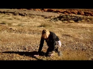 Cock sucking bound submissive revels in ass whipping and rimjob action in red rocky landscape under the hot sun